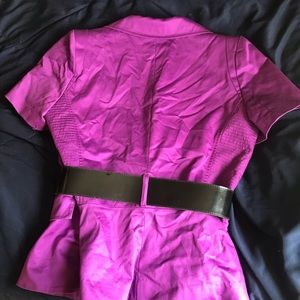 Purple open blazer with a belt.